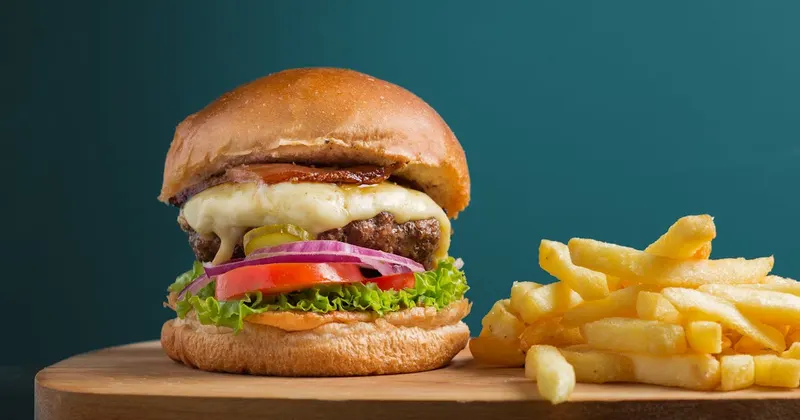 Kitchen counter with natural cleaning supplies and fresh herbs