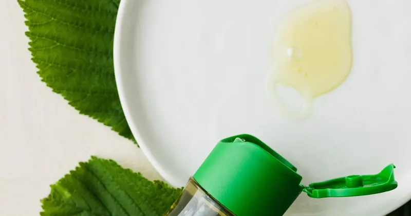 Baby oil in a glass bottle used for polishing and cleaning surfaces