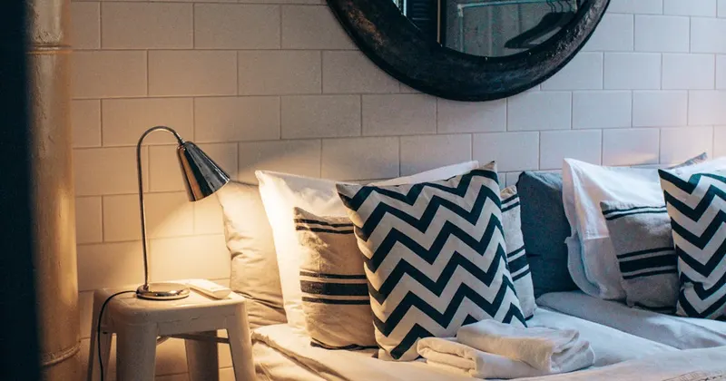 Person deep cleaning walls and ceiling surfaces