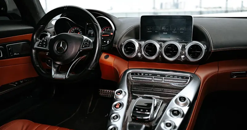 Clean and organized car interior with polished dashboard and seats