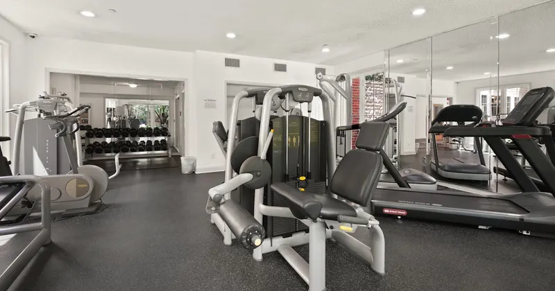 Spacious home gym interior with organized fitness equipment