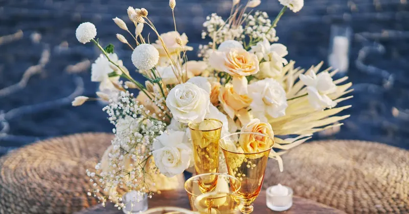 Bouquet of roses decorating a table prepared for a romantic dinner