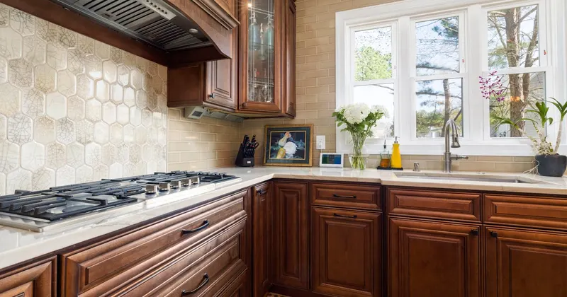 Farmhouse kitchen with elegant wooden cabinets and modern appliances