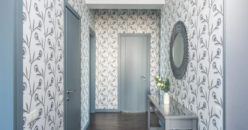 Clean organized home entryway with console table and mirror