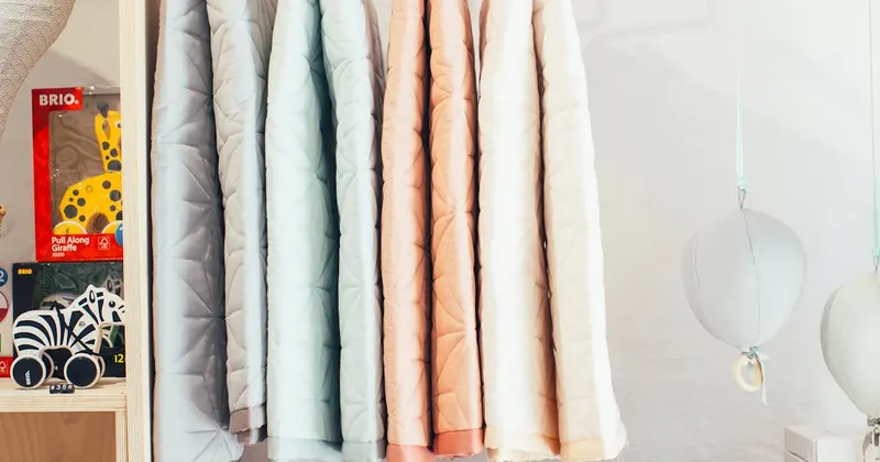 Various bathroom accessories and towels organized on shelves