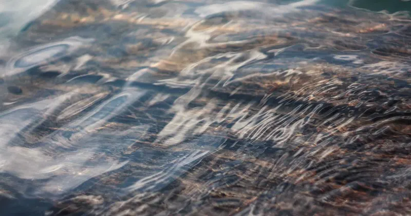 Children bedroom interior with wooden furniture and toys on shelves