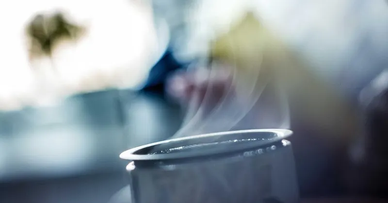 Collection of cleaning products organized in a portable caddy